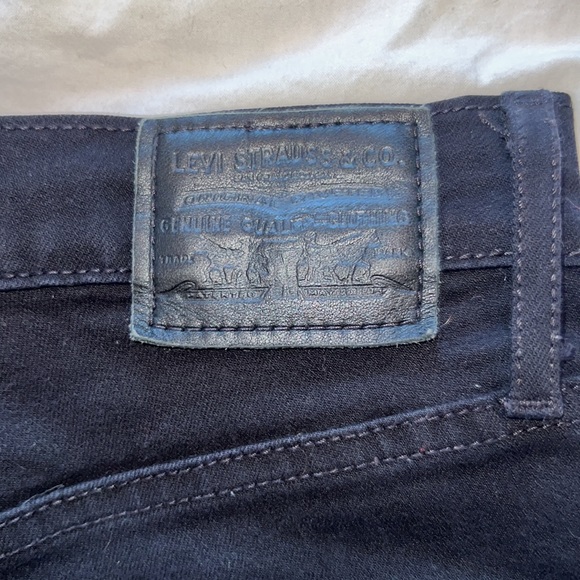 Black super high rise ripped skinny jeans from Levi’s - Picture 3 of 6